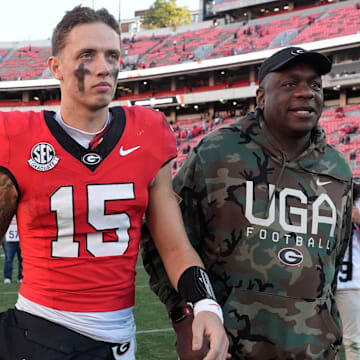 Georgia quarterback Carson Beck leaves the field after a win over Massachusetts on Nov. 23.