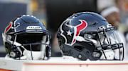 Aug 9, 2024; Pittsburgh, Pennsylvania, USA;  Houston Texans helmets sit on an equipment trunk during the second quarter against the Pittsburgh Steelers at Acrisure Stadium. Mandatory Credit: Charles LeClaire-Imagn Images