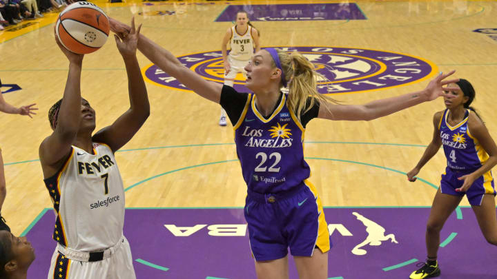 May 24, 2024; Los Angeles, California, USA; Los Angeles Sparks forward Cameron Brink (22) blocks a shot by Indiana Fever forward Aliyah Boston (7) in the first half at Crypto.com Arena. May 24, 2024; Los Angeles, California, USA; Los Angeles Sparks forward Cameron Brink (22) blocks a shot by Indiana Fever forward Aliyah Boston (7) in the first half at Crypto.com Arena.