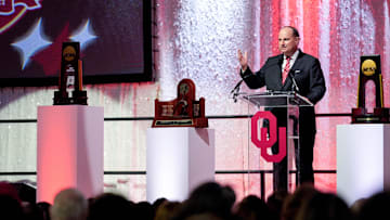 Athletic director Joe Castiglione speaks during an NCAA championship celebration for OU gymnastics.