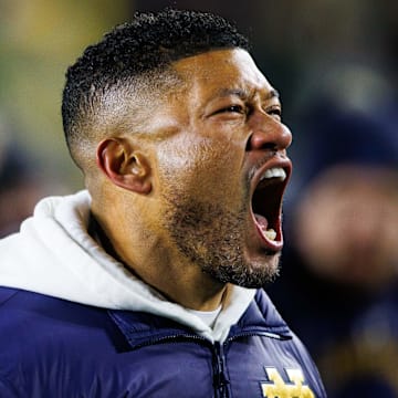 Notre Dame head coach Marcus Freeman celebrates after winning the first round of the College Football Playoff 27-17 against Indiana at Notre Dame Stadium on Friday, Dec. 20, 2024, in South Bend.