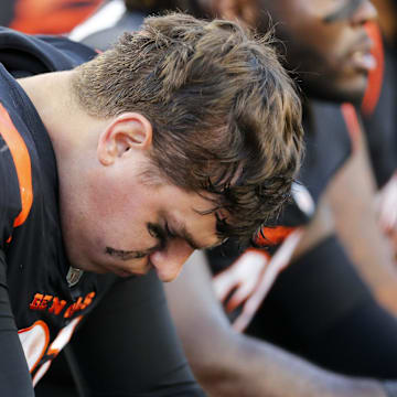 Cincinnati Bengals defensive end Trey Hendrickson hangs his head on the sideline in the fourth quarter of the NFL Week 9 game between the Cincinnati Bengals and the Cleveland Browns.