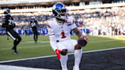 Jan 5, 2025; Philadelphia, Pennsylvania, USA; New York Giants wide receiver Malik Nabers (1) scores a touchdown against the Philadelphia Eagles during the fourth quarter at Lincoln Financial Field.  