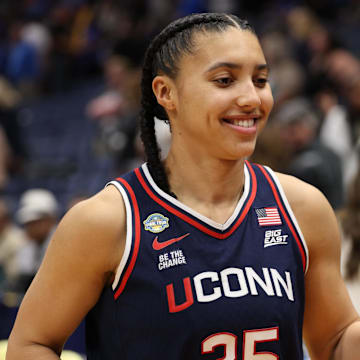 Connecticut Huskies guard Azzi Fudd leaves the court after a win.