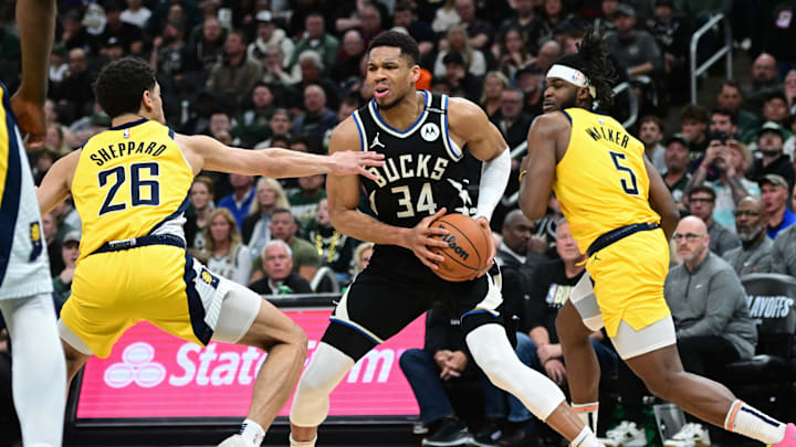 Apr 27, 2025; Milwaukee, Wisconsin, USA; Milwaukee Bucks forward Giannis Antetokounmpo (34) looks for a shot against Indiana Pacers guard Ben Sheppard (26) and forward Jarace Walker (5) in the third quarter during game four of first round for the 2024 NBA Playoffs at Fiserv Forum. Mandatory Credit: Benny Sieu-Imagn Images Apr 27, 2025; Milwaukee, Wisconsin, USA; Milwaukee Bucks forward Giannis Antetokounmpo (34) looks for a shot against Indiana Pacers guard Ben Sheppard (26) and forward Jarace Walker (5) in the third quarter during game four of first round for the 2024 NBA Playoffs at Fiserv Forum. Mandatory Credit: Benny Sieu-Imagn Images