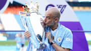 Pep Guardiola with the Premier League title in 2024.