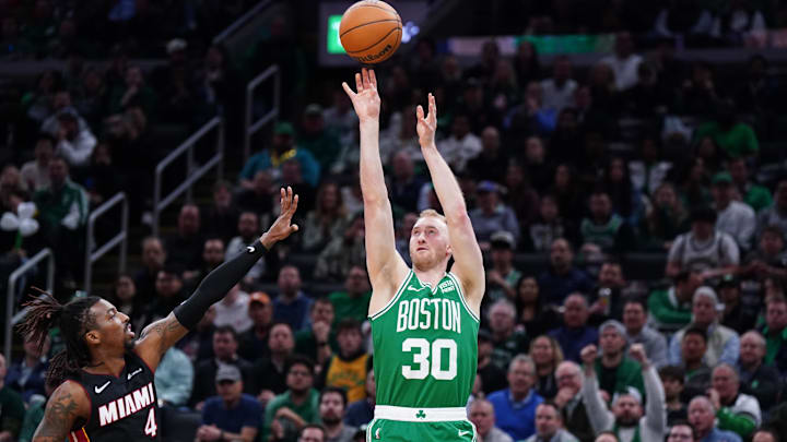 Apr 24, 2024; Boston, Massachusetts, USA; Boston Celtics forward Sam Hauser (30) shoots for three points against Miami Heat guard Delon Wright (4) in the second quarter during game two of the first round for the 2024 NBA playoffs at TD Garden. Mandatory Credit: David Butler II-Imagn Images Apr 24, 2024; Boston, Massachusetts, USA; Boston Celtics forward Sam Hauser (30) shoots for three points against Miami Heat guard Delon Wright (4) in the second quarter during game two of the first round for the 2024 NBA playoffs at TD Garden. Mandatory Credit: David Butler II-Imagn Images