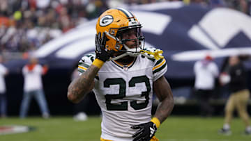 Green Bay Packers cornerback Jaire Alexander gestures to the fans before the game against the Chicago Bears at Soldier Field. 