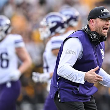 Oct 26, 2024; Iowa City, Iowa, USA; Northwestern Wildcats head coach David Braun reacts during the third quarter against the Iowa Hawkeyes at Kinnick Stadium. Mandatory Credit: Jeffrey Becker-Imagn Images