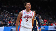 Mar 21, 2025; Seattle, WA, USA; Arizona Wildcats forward Carter Bryant (9) reacts after dunking the ball against the Akron Zips during the first half in the first round of the NCAA Tournament at Climate Pledge Arena. Mandatory Credit: Steven Bisig-Imagn Images