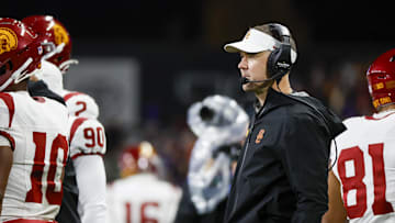 Nov 2, 2024; Seattle, Washington, USA; USC Trojans head coach Lincoln Riley stands on the sideline during the fourth quarter against the Washington Huskies at Alaska Airlines Field at Husky Stadium. Mandatory Credit: Joe Nicholson-Imagn Images