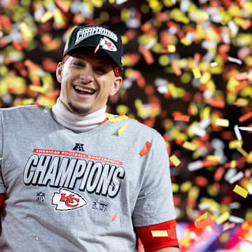Jan 26, 2025; Kansas City, MO, USA; Confetti falls as Kansas City Chiefs quarterback Patrick Mahomes celebrates after defeating the Buffalo Bills during the AFC Championship game at GEHA Field at Arrowhead Stadium. Mandatory Credit: Mark J. Rebilas-Imagn Images
