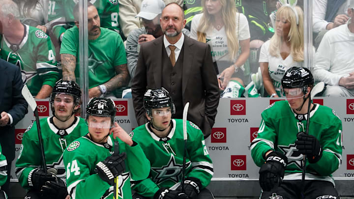 Apr 19, 2025; Dallas, Texas, USA; Dallas Stars head coach Peter DeBoer on the bench during the second period in game one of the first round of the 2025 Stanley Cup Playoffs against the Colorado Avalanche at American Airlines Center. Mandatory Credit: Raymond Carlin III-Imagn Images Apr 19, 2025; Dallas, Texas, USA; Dallas Stars head coach Peter DeBoer on the bench during the second period in game one of the first round of the 2025 Stanley Cup Playoffs against the Colorado Avalanche at American Airlines Center. Mandatory Credit: Raymond Carlin III-Imagn Images