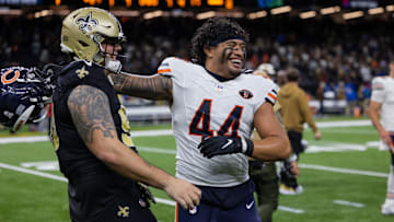 Bears linebacker Noah Sewell with New Orleans Saints defensive tackle Bryan Bresee after a 2023 game in New Orleans.