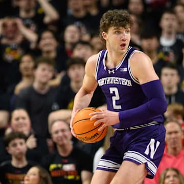 Mar 8, 2025; College Park, Maryland, USA; Northwestern Wildcats forward Nick Martinelli (2) handles the ball during the first half against the Maryland Terrapins at Xfinity Center. Mandatory Credit: Reggie Hildred-Imagn Images