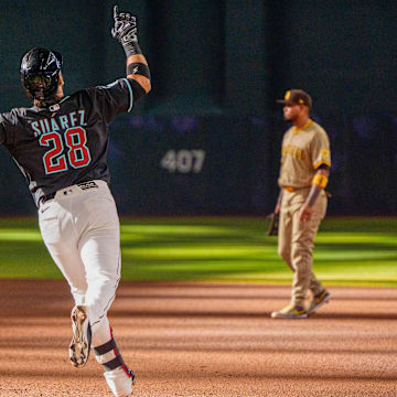 Jun 14, 2025; Phoenix, Arizona, USA; Arizona Diamondbacks infielder Eugenio Suarez (28) celebrates after hitting a home run in the fourth inning against the San Diego Padres at Chase Field. Mandatory Credit: Allan Henry-Imagn Images