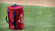 Apr 29, 2021; Arlington, Texas, USA; A view of the Boston Red Sox logo and a field bag during batting practice before the game between the Texas Rangers and the Boston Red Sox at Globe Life Field. Mandatory Credit: Jerome Miron-Imagn Images