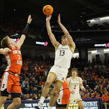 Dec 6, 2024; Evanston, Illinois, USA; Illinois Fighting Illini forward Ben Humrichous (3) defends Northwestern Wildcats guard Brooks Barnhizer (13) during the second half at Welsh-Ryan Arena. Mandatory Credit: David Banks-Imagn Images