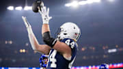 Penn State Nittany Lions tight end Tyler Warren (44) catches a touchdown pass against the Boise State Broncos in the Fiesta Bowl at State Farm Stadium. 