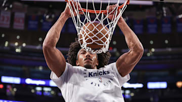 Dec 1, 2024; New York, New York, USA;  New York Knicks center Jericho Sims (20) warms up prior to the game against the New Orleans Pelicans at Madison Square Garden. Mandatory Credit: Wendell Cruz-Imagn Images