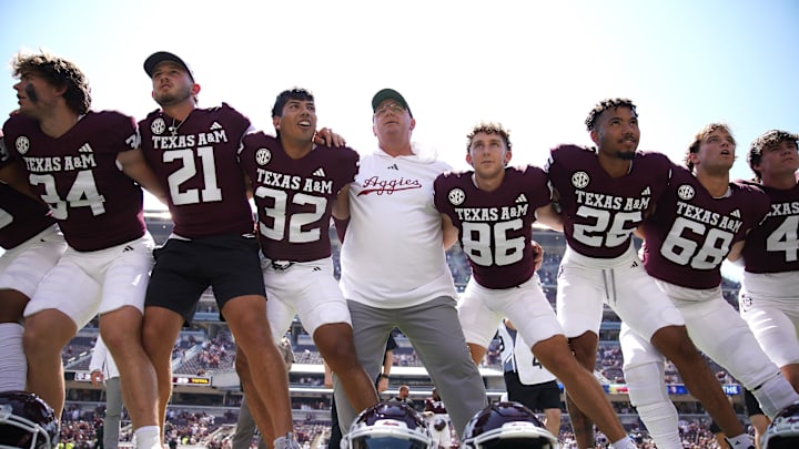 Sep 7, 2024; College Station, Texas, USA; Texas A&M Aggies head coach Mike Elko celebrates a 52-10 win against the McNeese State Cowboys at Kyle Field. Mandatory Credit: Dustin Safranek-Imagn Images Sep 7, 2024; College Station, Texas, USA; Texas A&M Aggies head coach Mike Elko celebrates a 52-10 win against the McNeese State Cowboys at Kyle Field. Mandatory Credit: Dustin Safranek-Imagn Images