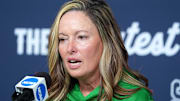 Oregon head softball coach Melyssa Lombardi speak during a press conference at media and practice day for the Women's College World Series at Devon Park in Oklahoma City, Wednesday, May, 28, 2025.