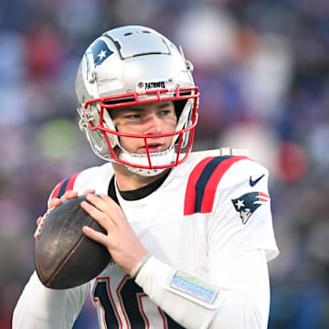 Dec 22, 2024; Orchard Park, New York, USA; New England Patriots quarterback Drake Maye (10) warms up before a game against the Buffalo Bills at Highmark Stadium. Mandatory Credit: Mark Konezny-Imagn Images
