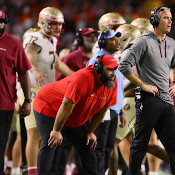 Oct 26, 2024; Miami Gardens, Florida, USA; Florida State Seminoles head coach Mike Norvell watches from the sideline against the Miami Hurricanes during the second quarter at Hard Rock Stadium. Mandatory Credit: Sam Navarro-Imagn Images