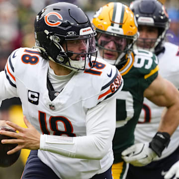 Caleb Williams flees the pocket last season in the finale against the Packers, a 24-22 Bears win.