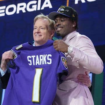 NFL commissioner Roger Goodell with Georgia Bulldogs safety Malaki Starks after he is selected by the Baltimore Ravens.