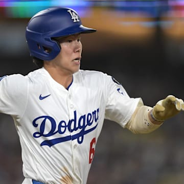 Los Angeles Dodgers second baseman Hyeseong Kim (6) beats out an infield hit in the fourth inning against the Los Angeles Angels at Dodger Stadium on May 16.