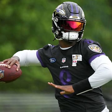 Jul 29, 2022; Owings Mills, MD, USA; Baltimore Ravens quarterback Lamar Jackson (8) practices at the Under Armour Performance Center. Mandatory Credit: Mitch Stringer-Imagn Images
