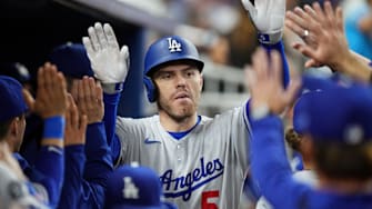 Los Angeles Dodgers first baseman Freddie Freeman (5) celebrates after hitting a home run against the Miami Marlins at loanDepot Park. 