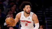 Detroit Pistons guard Cade Cunningham dribbles the ball.