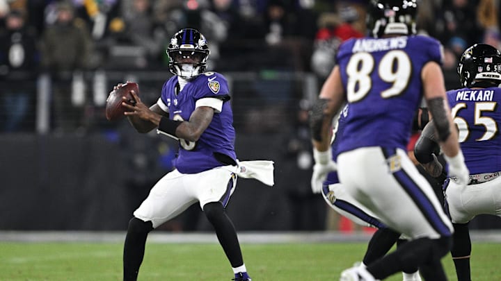 Jan 11, 2025; Baltimore, Maryland, USA; Baltimore Ravens quarterback Lamar Jackson (8) looks to pass against the Pittsburgh Steelers in the third quarter in an AFC wild card game at M&T Bank Stadium. Mandatory Credit: Tommy Gilligan-Imagn Images