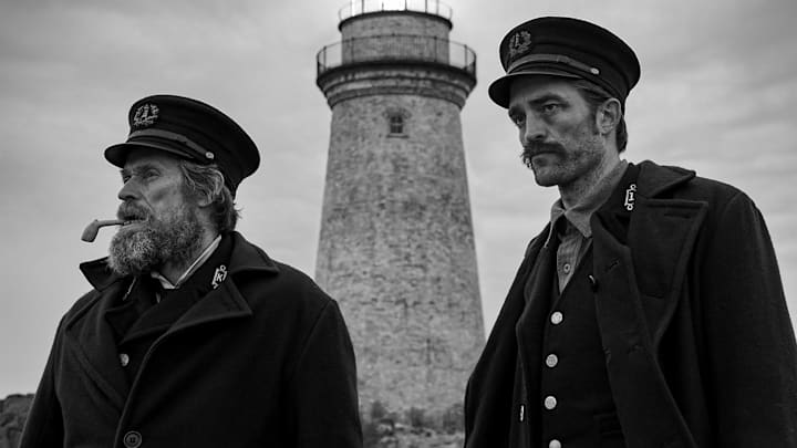 Willem Dafoe and Robert Pattinson in director Robert Eggers THE LIGHTHOUSE. Credit : A24 Pictures